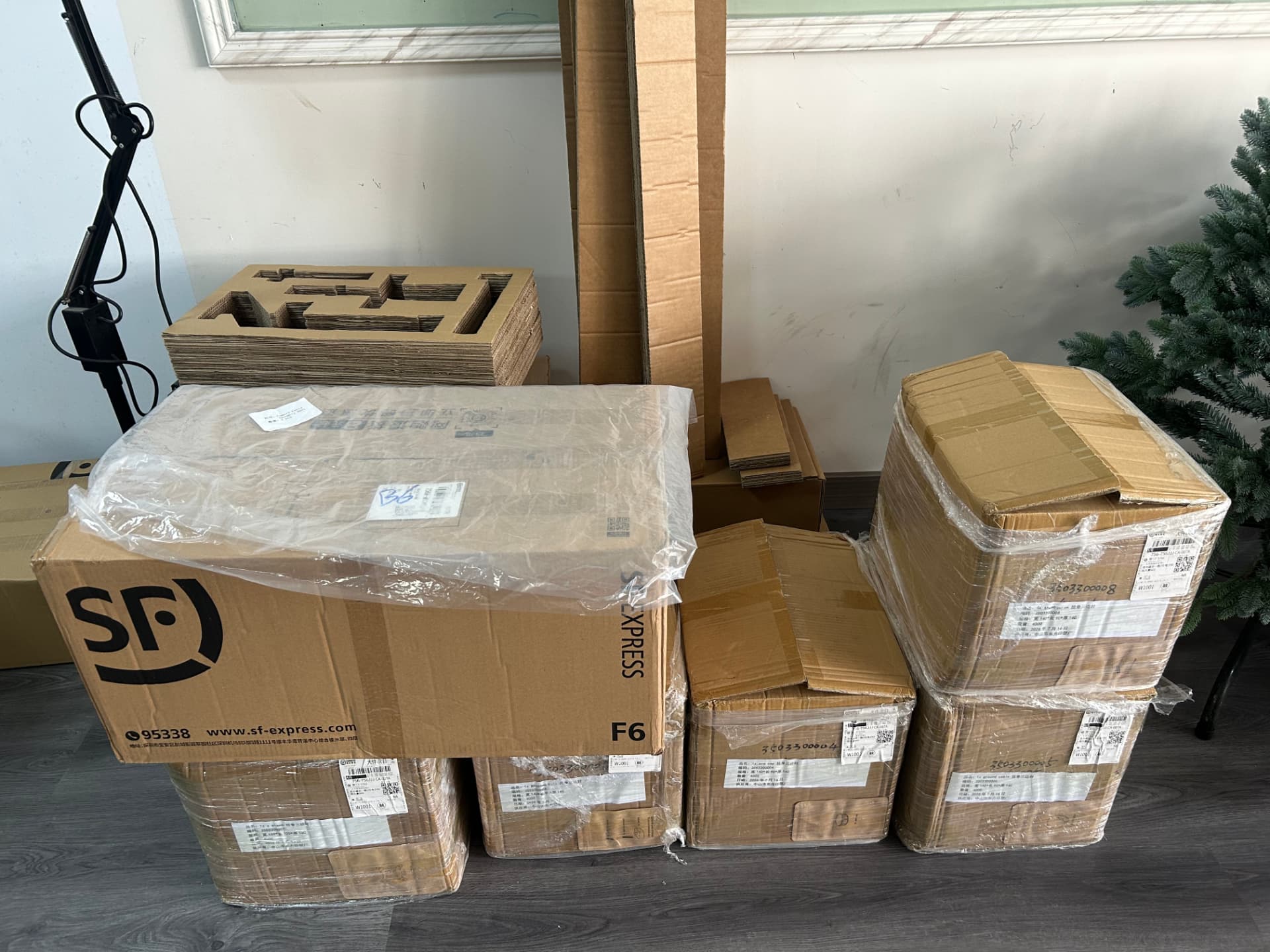 Cartons of client goods waiting to be checked